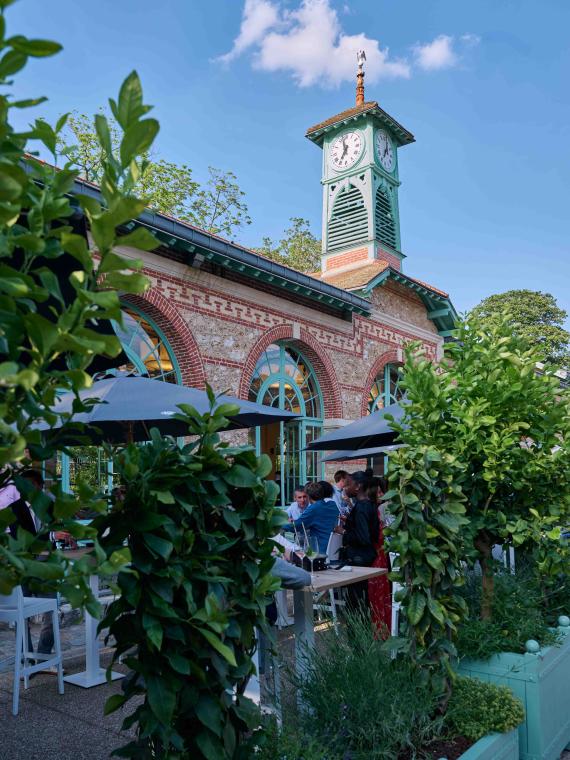 The facade and the garden of the Orangerie area at Roland-Garros