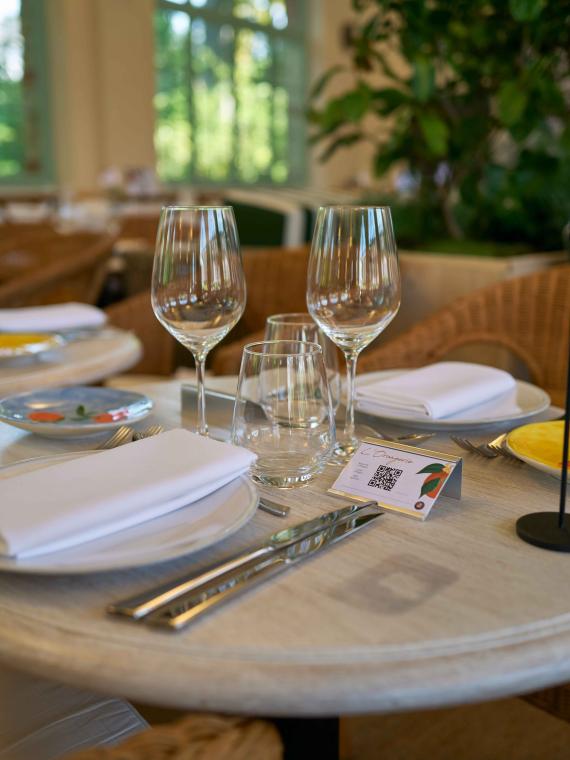 A VIP hospitality table from the Orangerie at Roland-Garros and its cutlery