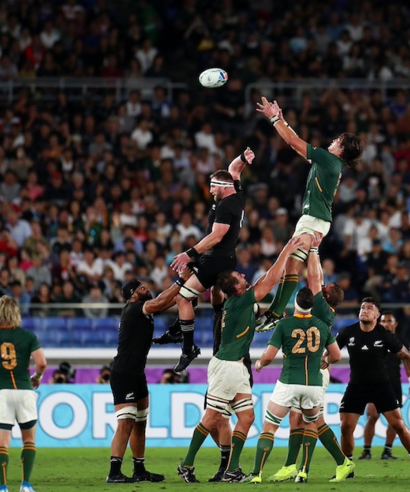 Rugby players from the South Africa and New Zealand teams on the pitch during the Rugby World Cup final match